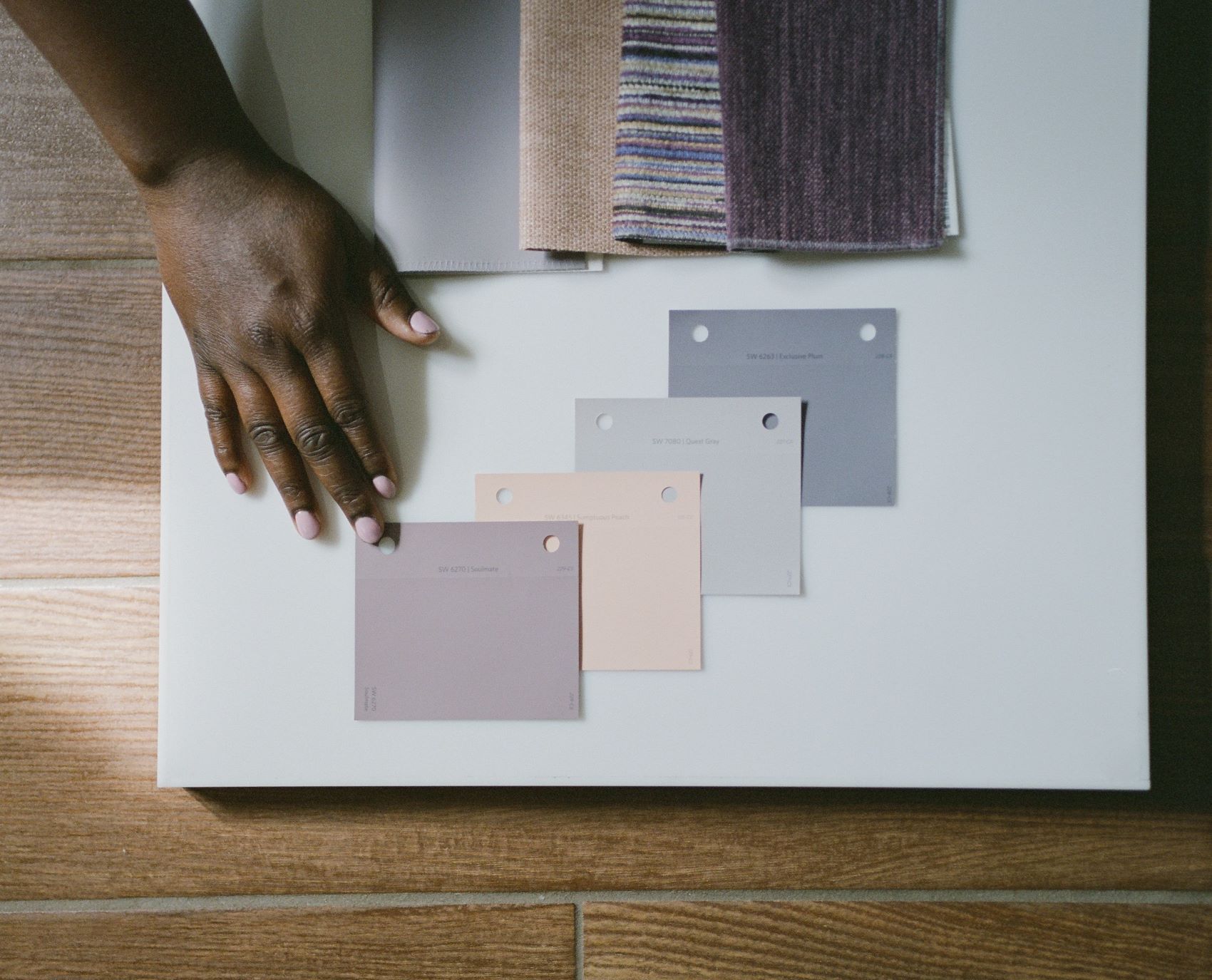 Paint swatches and color samples for the Yuri Kochiyama lounge