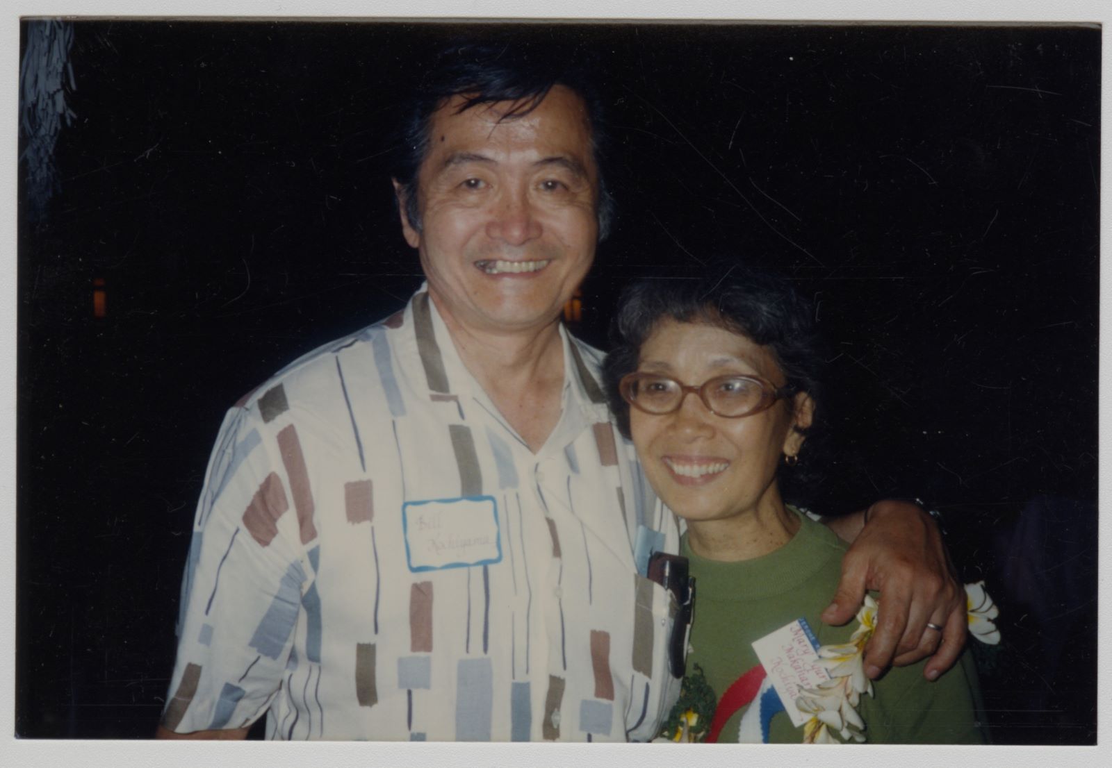 Bill and Yuri smiling for a posed photo